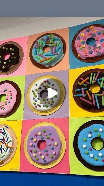 Lauralee Chambers🌀 on Instagram: "Time to share the donuts!!!

This was a really engaging and successful lesson for all 7 third grade classes! I had my husband drill holes in stacks of 10 plates with a circle drill. 10” plates are mounted on 12x12” paper with hot glue. Frosting and donuts are tempera and almost all toppings were grabbed at @retakeremake my go to for all things art! Displaying these was a game of strategy to get a variety in three rows across 36’ x3’ bulletin board. If you only see my posts, be sure to check out my stories every day!

@mychinet @retakeremake @dunkin @earthlingerin thanks for your 2017 post. I never forgot it🩷" Food Art Elementary, Paper Plate Art Projects, Donut Activity Preschool, Paper Plate Donut Craft, Food Themed Art Projects For Kids, Art Class Bulletin Boards Elementary, Donut Art Project For Kids, Circle Art Preschool, Circle Activity For Preschool