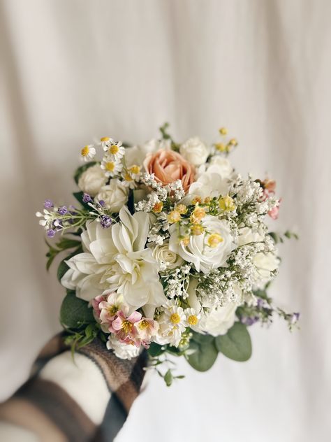 "These beautiful artificial wedding bouquets are made from faux flowers of white, off white and colorful flowers, sage greenery and silk eucalyptus. They will make the perfect addition to your big day!  This bridal bouquet consists of roses, peonies and dahlias with green silk eucalyptus and sage greenery and fillers. The stems are wrapped in twine. The bridal bouquet pictured is 12\" (30 cm). Bouquet Size Available: Bridal Bouquet- 12\" (30 cm) Bridesmaids Bouquet - 7\" (17 cm) Toss bouquet 6\" (15 cm) Matching bridesmaids bouquets, toss bouquet, corsages and boutonnières and other accessories are available." White Flower And Greenery Bouquet, Cute Wedding Flowers, Simple Pastel Bouquet, Sage Greenery Wedding, Aesthetic Bridal Bouquet, Wedding Bouquets Without Roses, Gardina Flowers Wedding, Summer Sage Wedding, Small Green Bouquet