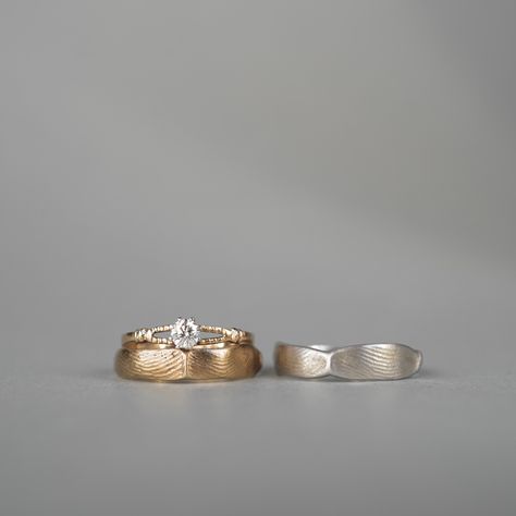 Wedding rings with fingerprints on the wedding band, omote fingerprint wedding rings By placing a pair of fingerprints on one ring, these wedding rings remind us to think of each other and support each other even when we are apart, creating a sense of connection. We propose bridal jewelry that is an extension of your own sense of beauty and sensitivity, which is connected to your fashion and lifestyle. Wedding rings Omote finger ring Engagement Rings tatsuonagahata Wedding Ring Stack, Fingerprint Wedding, Marriage Ring, Support Each Other, Ring Stack, One Ring, Finger Ring, Bridal Ring, Ring Engagement