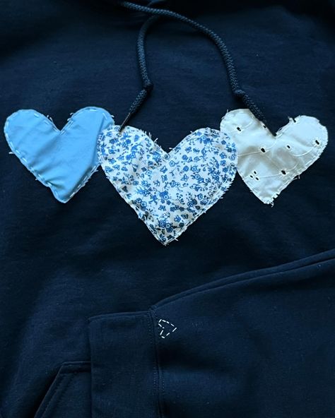 3 hearts sweatshirt 🩵💙🤍! Available in multiple colors and customizable! Check out the link in bio for more information! Sweatshirts With Patches, Patch Work Hoodie, Patch Sweatshirt Diy, Diy Hoodies, Patched Hoodie, Patchwork Projects, Clothes Embroidery, Easy Diy Clothes, Patchwork Ideas