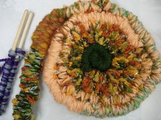 Ravelry: WindWaterWeaver's Autumn Leaves - Round (Spiral) Weaving Stick Rug Weaving Sticks, Stick Weaving, Stitched Together, Textile Art Embroidery, Weaving Tutorial, Woven Wall Art, Spinning Yarn, Needle Punch, Weaving Textiles