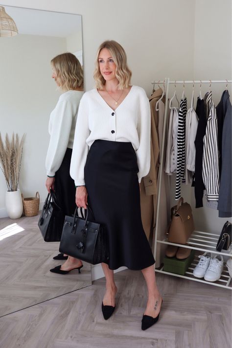 Satin Skirt Smart Casual, White And Black Office Outfit, White Cardigan And Skirt Outfit, Black Slip Skirt Styling, Black Silk Skirt Fall Outfit, Slip Skirt Office Outfit, Silk Skirt And Cardigan Outfit, Bias Skirt Outfit Summer, Satin Skirt And Cardigan Outfit