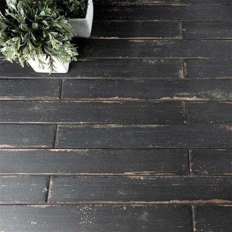 Merola Tile Retro Nero 2-3/4" x 23-1/2" Porcelain Floor and Wall Tile - Bed Bath & Beyond - 11669600 Farmhouse Style Tile Floors, Weathered Wood Floors, Tile And Dark Wood Floor Transition, Grey Slate Floor Kitchen, Industrial Farmhouse Flooring, Tile Floor To Wood Floor Transition, Black Barndo Interior, Mismatched Tile Floor, Rustic Kitchen Flooring