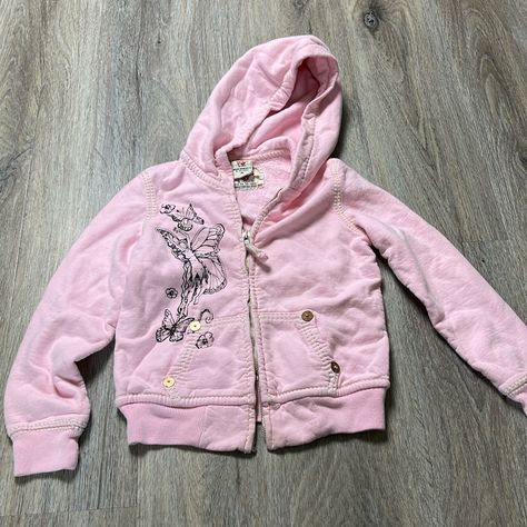 New With Tags True Religion Hooded Sweatshirt -Super Soft And Warm Sweatshirt -Light Pink With Black Fairy, Butterflies, And Flower Scene -Branded Brass Decorative Stud Details -White Contrast Stitching -Front Pockets -95% Cotton, 5% Spandex *****Please Note****** -Zip Up However Manufacturer Error Includes A Zipping Error. It Does Not Zip Down All The Way And Will Stop. Can Be Worn And Dealt With As Is Or Can Be Repaired Or Replaced. Size Youth Medium Total Length 18.5” Pit To Pit 15” Outfit Chart, Bf Clothes, True Religion Outfits, Latina Outfits, Black Fairy, Vintage Tee Shirts, Knitted Blankets, Dream Clothes, True Religion