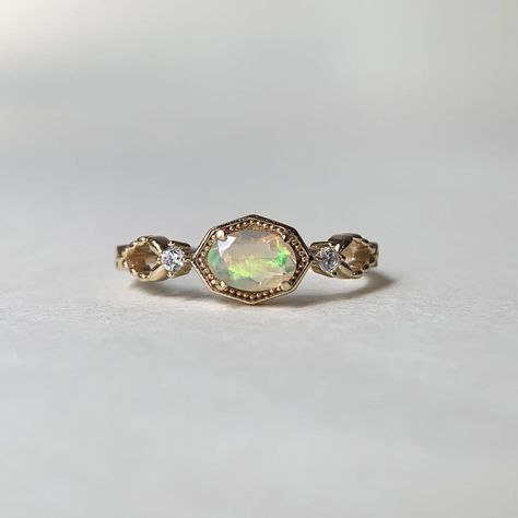 Vintage Gold Opal Engagement Ring Three Stone Promise Ring Natural Fire Opal Oval October Birthstone Rings for Women E393 💛 RING INFORMATION 💛 * Made to Order * Stone: natural african opal,cubic zirconia * Metal: Gold plated 925 sterling silver,if you need Solid 10k 14k 18k gold/white gold/rose gold,please contact me. 💛 FREE SHIPPING Beautiful gift box included. 💛 SIZES Please drop down the Options box to choose the ring size,if you can't sure the size,please go to the nearest local jewel shop to measure it. 💛 Thank you for visiting our shop! Feel free to contact me if you have any questions :) Opal Engagement Ring Gold, Vintage Engagement Rings Opal, Promise Ring Ideas, Oval Opal Engagement Ring, Opal Engagement Ring Vintage, Gold Opal Engagement Ring, Vintage Opal Ring, Opal Promise Ring, Small Engagement Rings