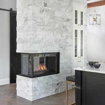 Marble Double Sides Fireplace Separating KItchen From Foyer Jobsite Trailer, Fireplace Island, Dual Sided Fireplace, Stone Cottage Homes, Living Room Zones, Natural Stone Fireplace, 3 Sided Fireplace, Two Sided Fireplace, Fireplace Pictures