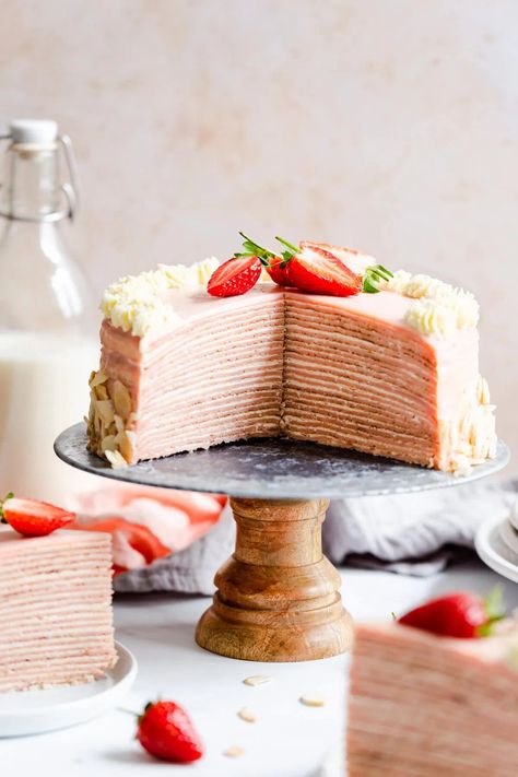 Impress your family and friends with this stunning strawberry crepe cake from Anna Banana! Layers of soft and light crepes and whipped cream, topped with strawberry ganache. Perfect centerpiece for any occasion! #crepecake #dessert Crepes Sweet, Strawberry Crepe Cake, Dessert Crepes, Crepe Cake Recipe, Lemon Ricotta Cake, Strawberry Crepes, Chocolate Crepes, Cake Strawberry, Ricotta Cake