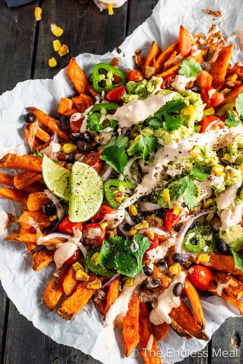 These loaded Mexican fries are made with crispy sweet potato fries layered with all the Mexican fixings and then drizzled with a spicy chipotle crema. #theendlessmeal #fries Potato Food Truck, Food Truck Ideas, Mexican Fries, Mexican Nachos, Mexican Sweet Potatoes, Potato Food, Nacho Fries, Healthy Fries, Crispy Sweet Potato Fries