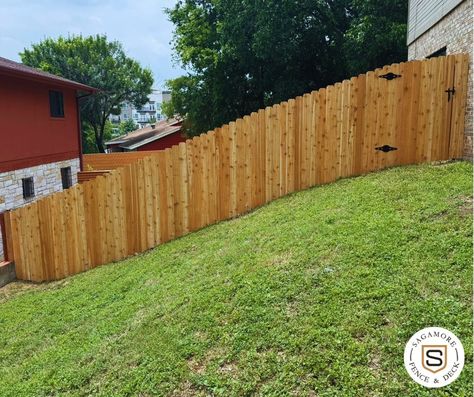 Fencing that goes with the flow! 😎 Our latest project showcases a beautiful fence seamlessly following the natural slope of a hill. #SagamoreFenceAndDeck #HillsideFence #BuiltBetter #CedarFence #GeorgetownTX Fence On Hill, Georgetown Tx, Cedar Fence, A Hill, May 31, Fencing, The Natural, Fence, Collage