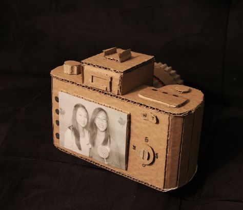 If I was to do a camera like this I would take their idea, or cut a whole where the screen is supposed to be, so that when you move the screen moves as well. Just like a real one. Cardboard Camera, Cardboard Props, Paper Camera, Cardboard Ideas, Animal Cardboard, Cardboard Model, Origami Lamp, Classroom Art Projects, Cardboard Sculpture