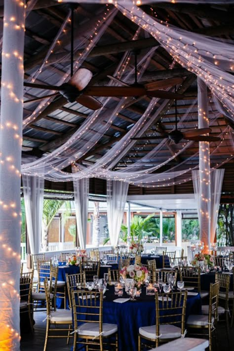 Navy and Gold Beach Side Wedding at Paradise Cove in Orlando Florida - Photo: Sivan Photography - Click pin for more photos  www.orangeblossombride.com Dark Blue Gold And White Wedding, Navy Blue And Gold Wedding Backdrop, Navy And Gold Beach Wedding, Navy Blue And Gold Reception Decor, Navy Blue And Blush Pink Wedding Backdrop, Once In A Lifetime Love, Navy And Gold Wedding, Navy Blue And Gold Wedding, Blue And Blush Wedding