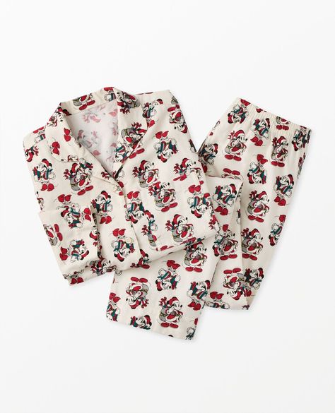 Perfect for Disney fans, our women's flannel pajama set features classic Minnie Mouse artwork with festive holiday details. • Unique artwork only available at Hanna • Our softest sueded cotton flannel • Hypoallergenic & eczema-friendly • Sensory-friendly scratch-free seams that lay flat on the skin • OEKO-TEX® STANDARD 100 certified safe from hundreds of harsh chemicals Disney Christmas Pajamas, Mouse Artwork, Classic Minnie Mouse, Disney Thanksgiving, Burr Basket, Womens Flannel Pajamas, Christmas Mickey, Christmas Pj, Disney Pajamas