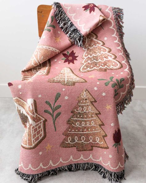 Add a whimsical touch to your holiday season with this pink, 100% cotton gingerbread throw. This blanket features a light-hearted festive design of gingerbread houses, gingerbread trees, and a friendly gingerbread man set against a soft pink background. The high-quality cotton weave of this blanket gives it a wonderful texture and helps ensure it will be part of your celebrations for years to come. Transform this blanket into something unique for your home, or make it an extra thoughtful gift by Christmas Throw Blanket, Pink Christmas Decorations, Christmas Throws, Cotton Throw Blanket, Christmas Inspo, Christmas Blankets, Cotton Throw, Merry Little Christmas, Christmas Aesthetic