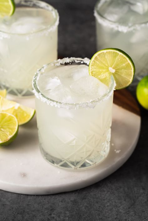 You only need a few simple ingredients to make these classic margaritas. They're perfect for warm summer nights out, or even for date night. This recipe is one you'll be coming back to again and again. #classic #margaritas #vegan #recipe #sweetsimplevegan #cocktail #bar #margarita #fresh #lime #citrus Simple Margarita Recipe, Simple Margarita, Chickpeas Benefits, Easy Margarita Recipe, Classic Margarita Recipe, Vegan Breakfast Options, Easy Margarita, Cookie Recipes Oatmeal Raisin, Most Popular Cocktails