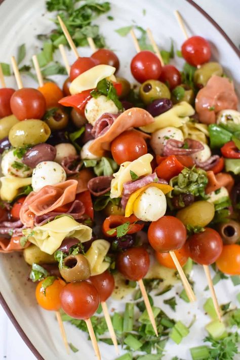 These delicious heavier appetizer recipes are perfect for a cocktail party or game night. They're great for a gathering when you want to serve substantial Hors d'oeuvres and not a full meal! Mozerella And Tomato Skewers, Scewers Appetizers Easy, Summer Snacks For Party Finger Foods, Sweet Skewers, Cold Appetizer Recipes, Mozzarella Skewers, Recipes For A Party, Italian Finger Foods, Meatball Skewers