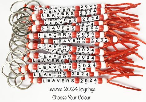 These lovely Leavers 2024 key rings make the perfect class gifts for children, as they move on to secondary education.    WHAT MAKES OUR KEYRINGS SPECIAL? We have set ourselves apart from other sellers by sourcing quality materials to make these special gifts: the split rings are stainless steel, the beads are smooth acrylic and the cord is 2mm silk macrame rattail. The beads are secured with a snake knot and cord ends are heat sealed to prevent fraying. Simply select the number of keyrings required, then choose colour.  As a small business we take pride in creating quality gifts at affordable prices. We hope you like our keychains as much as we do. Please visit our shop for other Class Gift ideas, including other Year 6 Leaver Gifts. Year 6 Graduation Ideas, Leavers Gifts Year 6, Year 6 Leavers Ideas, Year 6 Leavers Gifts, Year 6 Leavers Party, Leavers Party, Class Gifts, Snake Knot, School Leavers