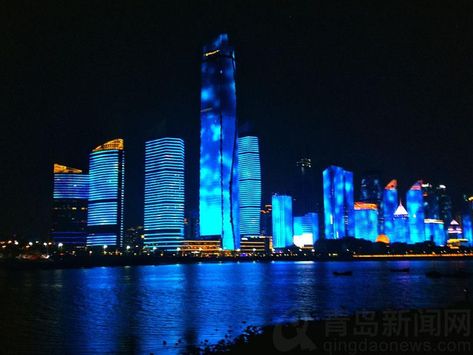 On the third beach of #Qingdao on a summer night, tourists are blowing the cool sea breeze, stepping on the soft beach, and watching the light show of Fushan Bay. Shanghai Aesthetic, China Beach, Asian Photography, Qingdao China, China City, Beach Night, Retro Waves, Chongqing, Futuristic City