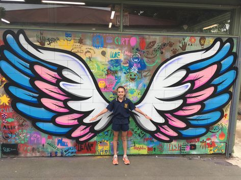 Mont Albert Primary School Mural | Blender Creatives | Creative Art ... Wing Mural, Seni Mural, Angel Wings Art, Wall Street Art, تصميم داخلي فاخر, School Wall Art, School Murals, School Painting, Zumba Dance