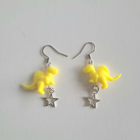 Yellow Dinosaur Earrings With Silver Star Charms. Made With Acrylic Beads. Nickel Free Findings. Brand New Condition. Ships Next Business Day Offers Are Welcome Trendy Jewelry 90s 2000s Unisex Festival Indie Gender Neutral Boho Bohemian Streetwear Urban Casual Gift For Her Or Him Birthday Present Quirky Alt Novelty Funky Hoop Earrings, Alt Earrings Diy, Fun Jewelry Aesthetic, Bohemian Streetwear, Alt Earrings, Silly Earrings, Jewelry 90s, Yellow Dinosaur, Shifting Script