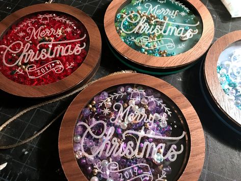 Christmas Shaker Ornaments, Shaker Ornaments Diy, Cnc Christmas Ornaments, Glowforge Christmas Ornaments, Christmas Glowforge Ideas, Laser Christmas Ornaments, Resin Christmas Ornaments Diy, Shaker Christmas Ornaments, Glowforge Ornaments