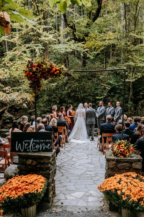 Bright oranges, yellows, reds and purples in the flowers | Huge orange mums | Wood welcome sign | Echelon Florist | Smoky Mountain Wedding | National Park Wedding | Fall Wedding | Spence Cabin Ceremony | Appalachian Clubhouse Reception | Derek Halkett Photography | Absolute Wedding Perfection Mums Flowers Wedding Decor, Mums Fall Wedding, Fall Foliage Wedding Decor, Mums At Wedding Ceremony, Fall Wedding Venue Decor, Fall Wedding Elopement Ideas, Fall Cottage Wedding, Tennessee Fall Wedding, Montana Fall Wedding