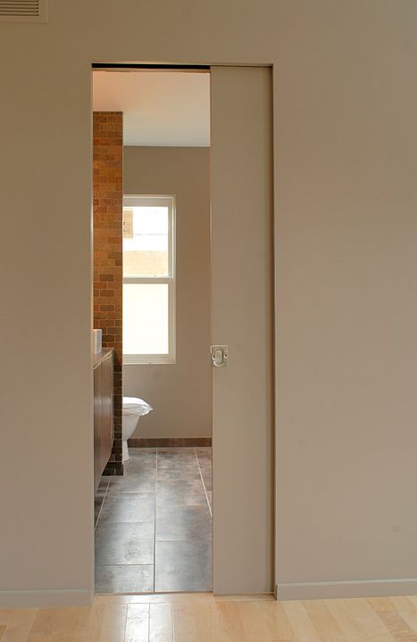 Pocket Door Trim, Bathroom Pocket Door Ideas, Bathroom Sliding Door Ideas, Bathroom Doors Ideas, Hidden Bathroom Door, Small Bathroom Door, Modern Pocket Doors, Ensuite Layout, Bathroom Sliding Door