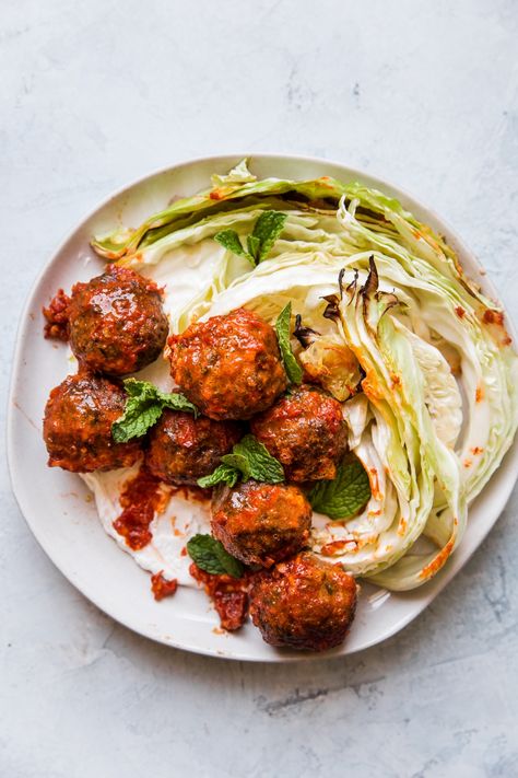 Sheet Pan Harissa Meatballs and Cabbage | The Modern Proper Meatballs And Cabbage, Harissa Meatballs, Meatball Seasoning, Spicy Ketchup, Meatball Dinner, The Modern Proper, Modern Proper, Easy Freezer Meals, Beef Meatballs