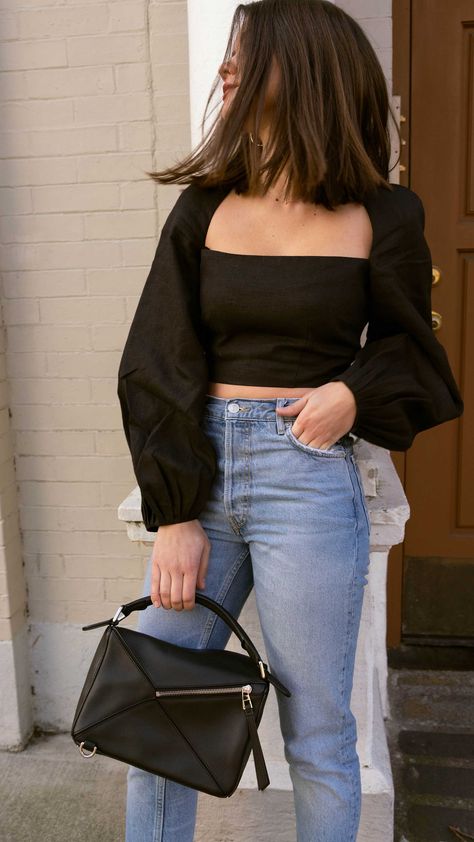 Sarah Butler of Sarah Styles Seattle wears Mara Hoffman Moon Crop Top with Gathered puff sleeves in black and Loewe Small Puzzle Shoulder Bag  | @sarahchristine, Seattle Blogger Puff Sleeve Top Outfit, Black Puff Sleeve Top, Black Top Outfit, Shoulder Tops Outfit, Off The Shoulder Top Outfit, Seattle Fashion, Crop Top With Jeans, Crop Top Outfits, Mode Streetwear