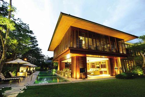 THE SECOND-FLOOR living room is surrounded by louver windows, screen panels, and tempered glass doors, which slide open to allow the panoramic view outside to wrap the vast room. Modern Filipino House, Philippine Architecture, Filipino House, Filipino Architecture, Philippine Houses, Architecture Facade, World Architecture Festival, Wallpaper Summer, Tropical Architecture