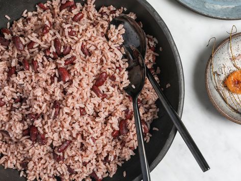 Jamaican Rice and Peas Recipe  - Briana Riddock | Food & Wine Jamaican Rice And Beans, Jamaican Rice And Peas Recipe, Jamaican Stew, Rice And Peas Recipe, Jamaican Rice And Peas, Caribbean Dishes, Jamaican Rice, Rice Peas, Stew Chicken