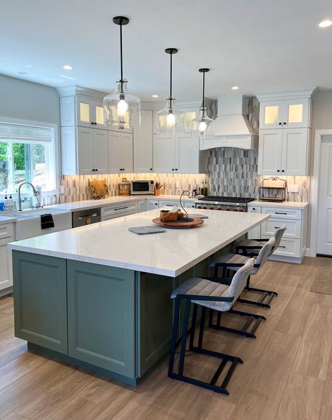 Sage green shaker style kitchen island with quartz countertops; overhang allowing for seating. Moss Green Island Kitchen, Green Island With White Cabinets, Olive Green Island In Kitchen, Dark Green Kitchen Island White Cabinets, Hunter Green Kitchen Island, White Kitchen Sage Island, Different Color Kitchen Island, Dark Green Island Kitchen, Sage Green Island Kitchen