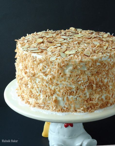 Coconut Almond Cream Cake is a coconut lover's dream cake and the perfect Easter dessert recipe. Coconut cake, almond cream filling, and coconut frosting! Almond Cream Cake Recipe, Almond Cream Filling, Almond Cream Cake, Easter Dinner Ideas, Cake Almond, Coconut Cream Cheese Frosting, Diy Easy Recipes, Coconut Frosting, Easter Desserts Recipes