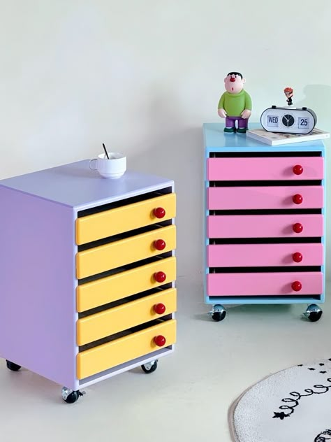 Add a splash of color and functionality to your home or office with our pastel-colored storage cabinet. Designed to keep your space organized while adding a stylish touch, this cabinet is perfect for storing files and other essentials. Enhance your decor with the vibrant elegance of our Pastel Colored Storage Cabinet. Whether used for organizing files or as a decorative piece, it’s sure to add both style and practicality to your space. Specifications Size: L40*W40*H60cm Material: MDF Wood Featur Funky Retro Decor, Weird Interior Design, Pastel Apartment, Kawaii House, Cart Coffee Table, Kitchen Cups, Colorful Storage, Cute Furniture, File Organizer