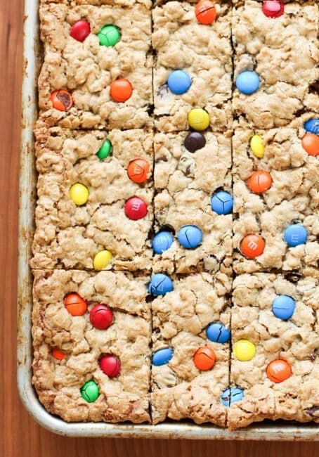 Monster Cookie Bars Recipe, Cookies And Candy, Monster Cookie Bars, Monster Cookie, Cookie Bar, Bar Cookies, Cookie Bar Recipes, Peanut Butter Chips, Candy Bars