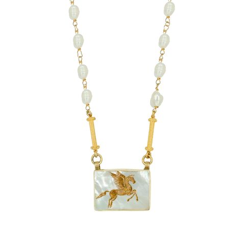 The Pegasus Necklace celebrates the ethereal beauty of the mythical winged horse, Pegasus, depicted through a stunning engraving on mother of pearl. Crafted with meticulous detail, the delicate image of Pegasus embodies grace, freedom, and transcendence. Encased in 22k gold vermeil, the necklace exudes a luxurious radiance, while the handcrafted chain, adorned with sea pearls, enhances its celestial charm. With each wear, let the Pegasus Necklace inspire you to reach new heights and embrace the Pegasus Necklace, Open Backs, Winged Horse, Unique Handcrafted Jewelry, August Birthstone Jewelry, July Birthstone Jewelry, Celestial Jewelry, Jewelry Ring Box, Pearl Jewellery Earrings