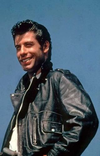 Danny Zuko | Grease Wiki | Fandom Grease Danny Zuko, Danny Zuko Grease, Johnny Travolta, Danny Grease, Grease Aesthetic, Rizzo Grease, Grease John Travolta, Rydell High, Boy Hairstyle