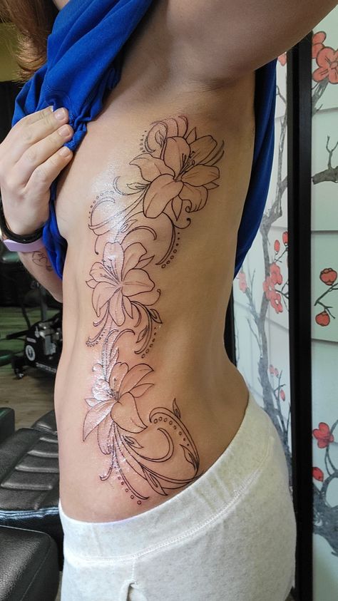 Complete side piece (outline)  13" long along ribs, waist, & hip. Will be shaded & colored 💙💜💗 Ink courtesy of Wesley @ Street Monkey Tattoo in Sheboygan, WI Cool Side Tattoos For Women, Water Lily Back Tattoo, Side Rib Cage Tattoos For Women, Lily Outline Tattoo, Side Tattoo Women, Floral Back Tattoo Women, Side Waist Tattoo, Side Stomach Tattoos Women, Side Tats