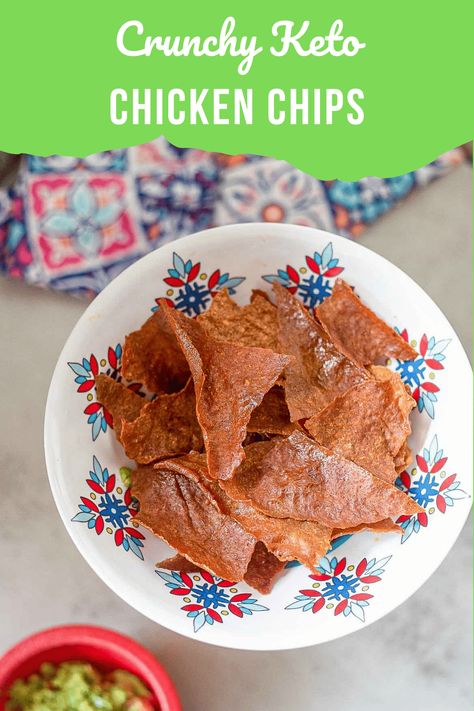 a plate of chicken chips with guacamole on the side Chicken Chips Keto, Chicken Chips Recipe Keto, Wilde Protein Chips, Chicken Chips Recipe, Carnivore Chips Recipe, Protein Chips Homemade, Keto Chicken Nuggets Canned Chicken, Crunchy Keto Snacks, Protein Chips Recipe