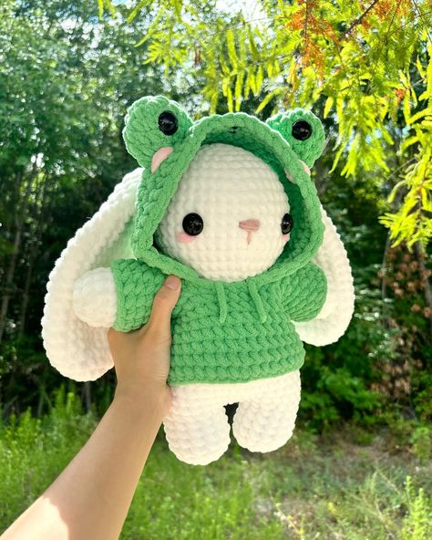 francis the frog bunny 🐰🐸 he is wearing a removable frog hoodie! bunny pattern available on my etsy ☁️ tags 🏷️ #crochet #crochetbunny #crochetaddict #crocheting #amigurumi #amigurumis #amigurumilove #smallbusiness #crochetplush #crochetplushie #crochetplushies #crocheted #crochetlove Bunny Plushies Crochet, Outfits To Crochet, Crochet Doll Ideas, Crochet Bear With Clothes, Crochet Bunny With Clothes, Crochet Bunny Plushies, Crocheted Bunny Pattern Free, Crochet Projects For Markets, Free Frog Crochet Pattern