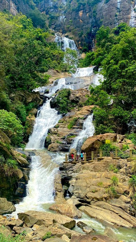 Looking for a breathtaking natural wonder to add to your bucket list? Look no further than the enchanting Ravana Falls! Nestled amidst the lush greenery of Sri Lanka, this majestic cascade is a sight to behold. Named after the legendary King Ravana from the Hindu epic Ramayana, this waterfall is steeped in fascinating lore. According to the myth, King Ravana had a palace nearby, making this spot an integral part of Sri Lanka's rich cultural tapestry. Whether you're a history buff or simply a... King Ravana, Holiday Centers, Sounds Of Nature, The Hindu, Soothing Sounds, Travel Packages, Lush Greenery, Amazing Destinations, Travel Agency