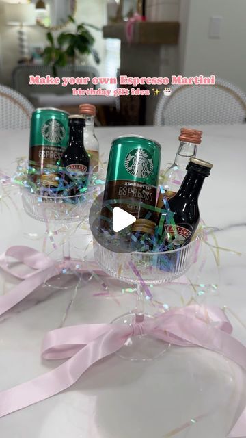 Amber Capps on Instagram: "A make your own espresso martini gift idea✨  I bought a set of coupe glasses from Amazon, tied a ribbon around the bottom of the glass + filled them with irredescent crinkle paper.   I used mini glass bottles and filled them with espresso beans to garnish with, added a can of espresso, mini bottles of vodka and coffee liqueur (I used Bailey’s because it’s the closet I could find in a mini bottle - I would normally use Kahlua ☕️) to each glass.   They were the perfect birthday gift for 2 of my friends who love espresso martinis! (+ so easy to make!)  . . . . . . #espressomartini #espresso #giftideas #giftideasforher #amazongiftideas #amazongiftideas #birthdaygifts #martinicocktail #giftsforher #easygiftideas #coupeglass #amazonfinds" Martini Glass Gift Ideas, Espresso Martini Gift Ideas, Espresso Martini Wedding Favours, Mini Espresso Martini, Espresso Martini Party Favors, Espresso Martini Gift Set, Mini Fireball Gift Ideas, Wine Glass Gift Ideas Filled Christmas, Diy Martini Glasses