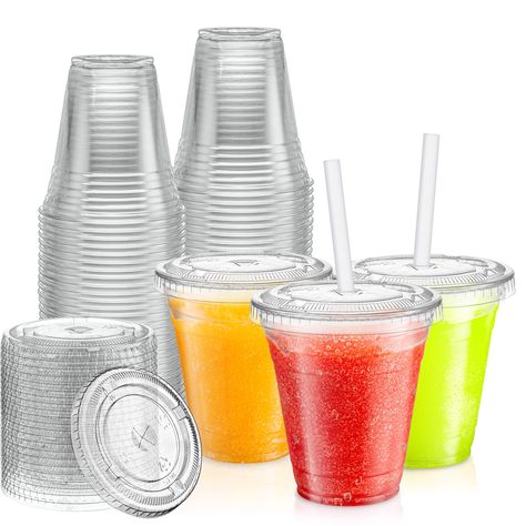 PRICES MAY VARY. 12 oz plastic cups with flat lids, with a whole for drinking straws - 100 Sets. Made from high-quality PET plastic to have a crystal clear look. Great for cold drinks like iced coffee, smoothies, bubble / buba tea, milkshakes & frozen cocktails, water, sodas, and juices. Durable & resistant cracking. Avoid the plastic cuts and mess. BPA-free and free of all questionable ingredients. These good-looking Zeml 12 oz. plastic cups with flat lids are made from high-quality PET plastic Plastic Cups With Lids, Smoothie Cups, Disposable Bowls, Smoothie Fruit, Fresh Squeezed Lemonade, Fountain Drink, Cocktail Cup, Cups With Lids, Smoothie Cup