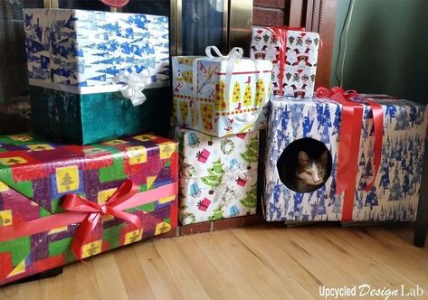 The cute & super clever reason she traces a bowl on a cardboard box! We have a lot of new / young and energetic pets in our house. So this holiday season I have modified a lot of our Christmas decorating to make it as pet friendly as possible. Cat Friendly Christmas Decorations, Cardboard Cat House, Space Christmas, Upcycle Design, Cardboard Cat, Easy Fall Wreaths, Pet Things, Cats Christmas, Christmas Boxes