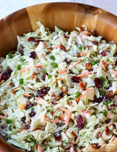 Take your coleslaw to a whole new level with sweet, tangy cranberries and crunchy pecans. Mix in an apple and some savory green onions then toss it all in a creamy dressing for a dish that's an amazing side for any gathering! Salad Coleslaw, Creamy Dressing, Buffalo Cauliflower, Recipes Delicious, Slaw Recipes, Crunchy Pecans, Coleslaw Recipe, Homemade Snacks, Salad Side Dishes