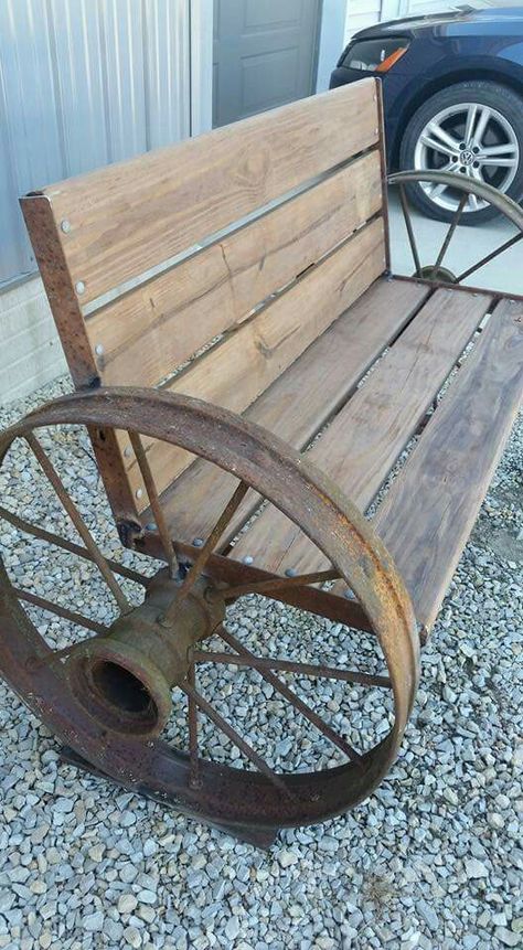 Steel wheel benches Wagon Wheel Ideas Outdoor, Iron Wheels Repurposed, Wagon Wheel Bench Ideas, Steel Wagon Wheel Ideas, Steel Wheels Ideas, Wagon Wheel Bench, Wagon Wheel Decor, Ginger Honey, Wagon Wheels