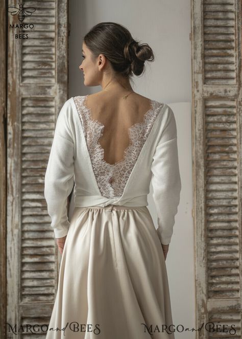 A wedding bolero is a beautiful accessory that can add an elegant touch to any bridal look, especially if it has sleeves. If you're wondering how to wear a wedding bolero with sleeves, here are a few tips to help you style it perfectly for your big day. Firstly, it's important to choose a bolero that complements your wedding dress. Look for a bolero that matches the fabric, color, and style of your dress. If your dress has lace details, opt for a lace bolero to create a cohesive look. Similarly, Blouse For Bride, Bolero Long Sleeve, Wedding Dress Topper, Lace Capelet, Wedding Sweater, Bridal Capelet, Dress Topper, Wedding Bolero, Long Sleeve Shrug