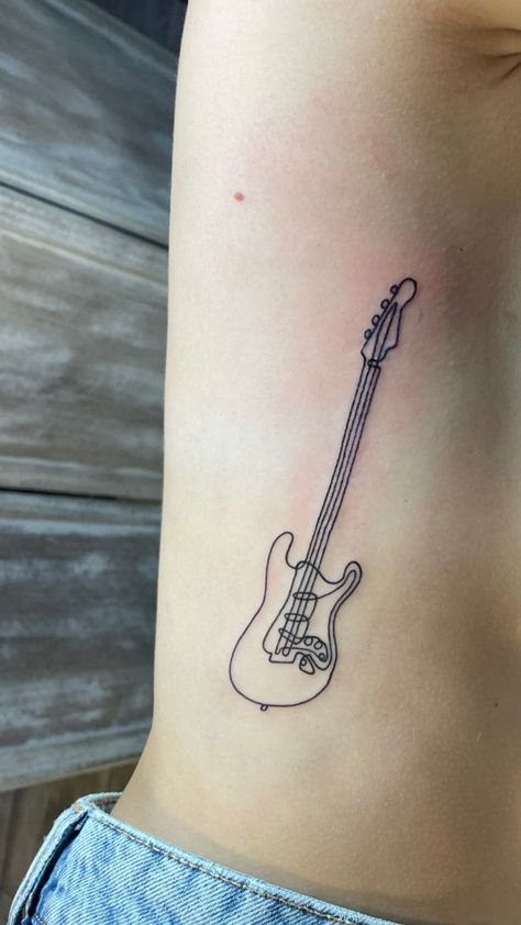 Small Rockstar Tattoo, Tattoo Ideas For Musicians, Musical Inspired Tattoos, Electric Guitar Tattoo Small, Classic Rock Tattoos Small, Unique Grunge Tattoos, Indie Music Tattoo, Rock Inspired Tattoos, The Beatles Tattoo Small