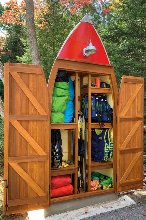 This guy turned an old boat…into a shed? Kayak Dock Storage, Boat Slip Ideas Lake Houses, Lakeside Dock Ideas, Boat Storage Shed, Boat Landscaping Ideas, Lake Shed Organization, Lake Dock Furniture Ideas, Boat House Storage Ideas, Lakeside Cottage Decor