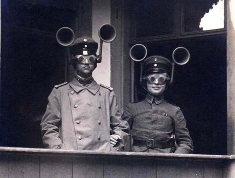 German sound location. The photograph shows a junior officer and an soldier from an unidentified Feldartillerie regiment wearing combined acoustic/optical locating apparatus. The small-aperture goggles were apparently set so that when the sound was located by turning the head, the aircraft would be visible. 1917. Perang Dunia Ii, Rare Historical Photos, Harriet Tubman, Rare Photos, Zeppelin, Historical Photos, Aliens, First World, Old Photos