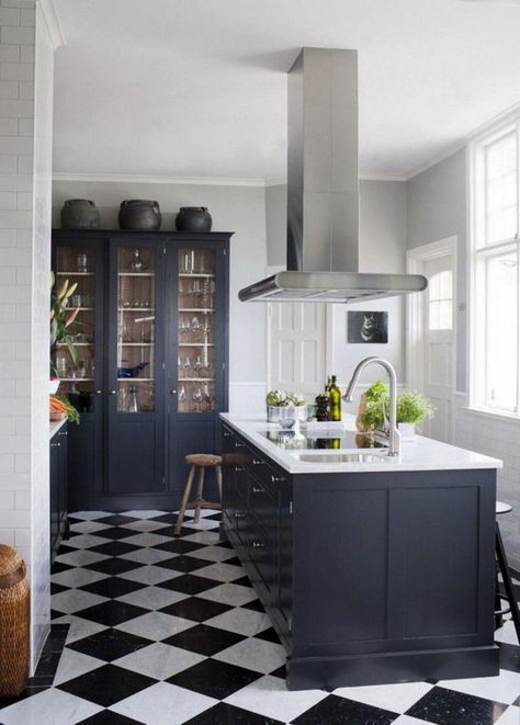 Black floors give a white kitchen instant visual impact.. Beauty in the details project details designer:. The appropriate white kitchen cabinets may work in any design, including a farmhouse, modern and trendy, and country cottage.. A few colors that look great in.You can look new details of White Cabinets Black Floors Kitchen by click this link : view details Black And White Floor Tile, Kitchen Floor Tile Design, White Kitchen Floor, White Tile Kitchen Floor, Black And White Floor, Black White Kitchen, Kitchen Floor Tiles Ideas, White Kitchen Tiles, Black And White Kitchen